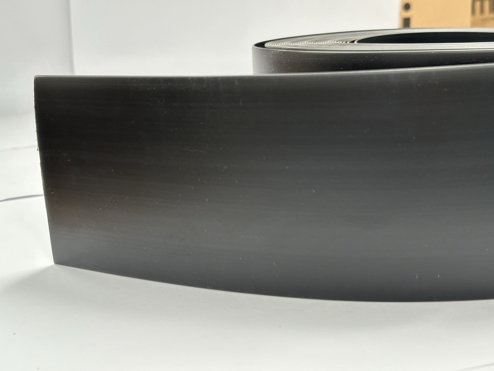 BLACK FLEXIBLE PVC FLAT SKIRTING BOARD 100mm Wide 25m roll. PREMIUM GRADE