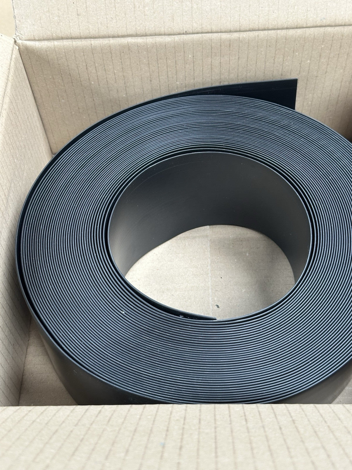 BLACK FLEXIBLE PVC FLAT SKIRTING BOARD 100mm Wide 25m roll. PREMIUM GRADE